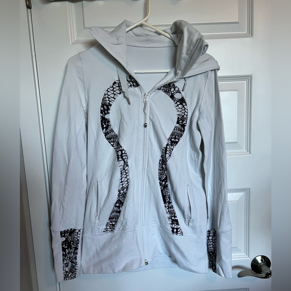 Used white Lululemon workout jacket